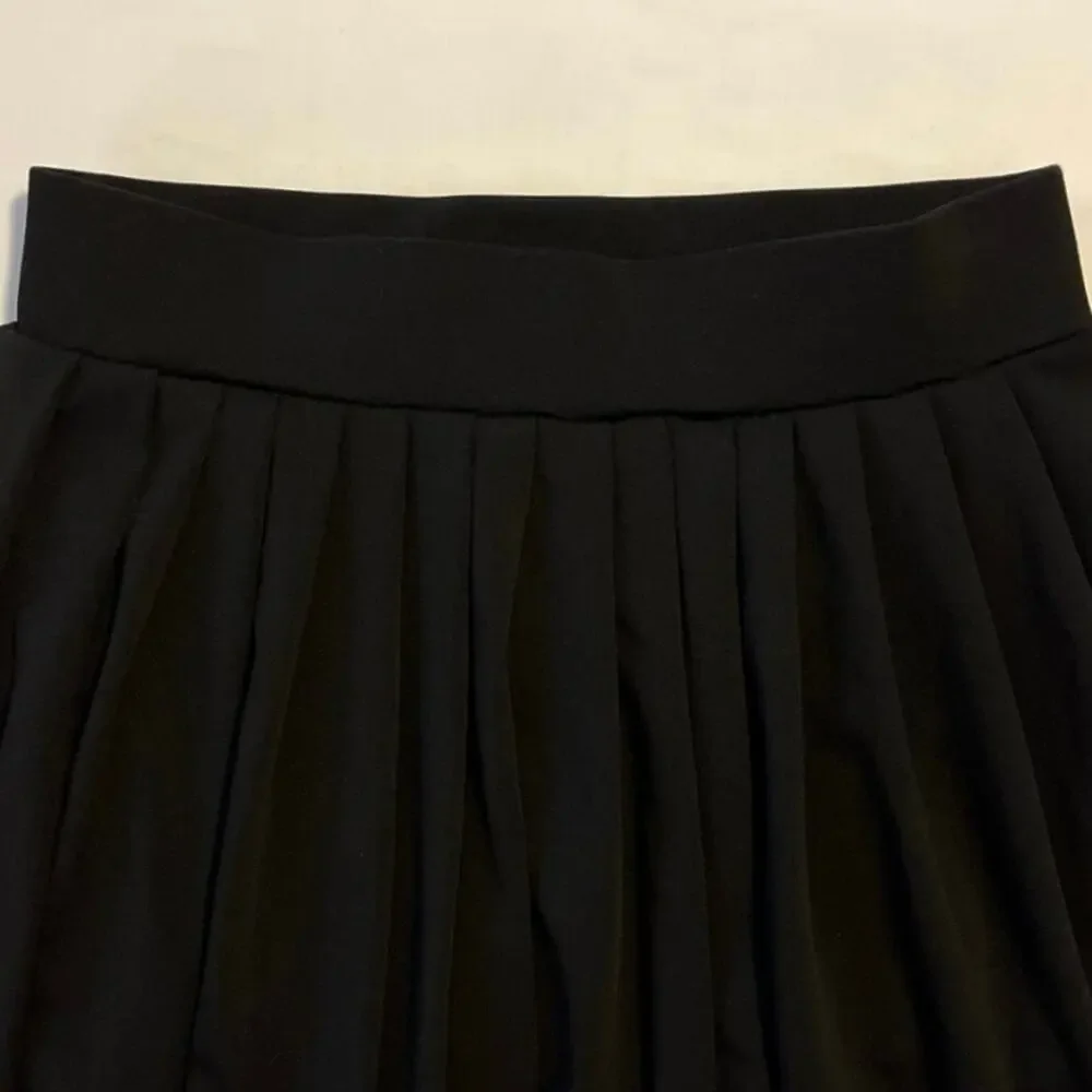 Indero Black Tennis Skort Womens Size L Pleated Feminine Pickleball Stretch Mini